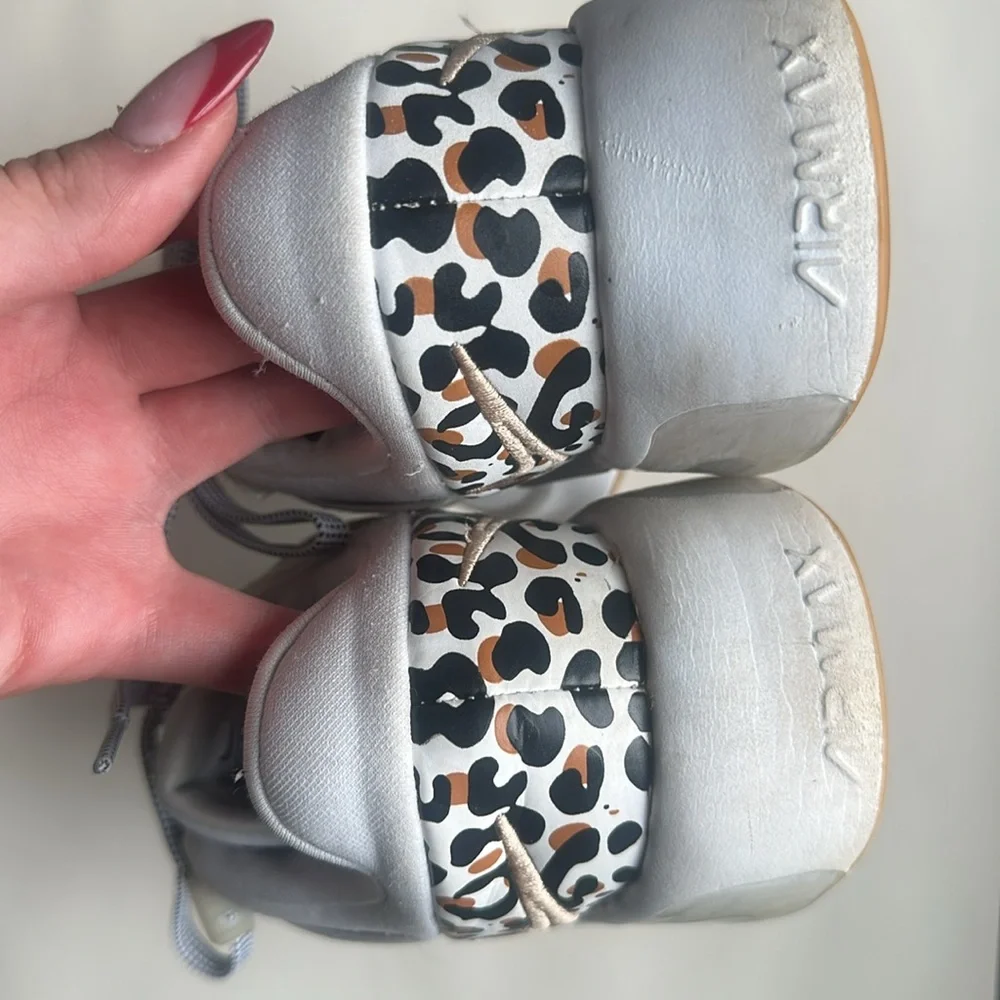 White Nike air max shoes, size 5 with gold Nike embroidering/cheetah print heal
